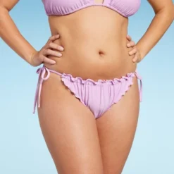 Women's Ruffle Side-Tie Adjustable Coverage Bikini Bottom - Wild Fable™ 11 Women's Ruffle Side-Tie Adjustable Coverage Bikini Bottom - Wild Fable™ -Wild Fable GUEST 14edd9f2 a491 4484 be9f e6a51628348d