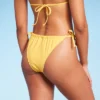 Women's Side-Tie Ultra High Leg Adjustable Coverage Bikini Bottom - Wild Fable™ Yellow 1 Women's Side-Tie Ultra High Leg Adjustable Coverage Bikini Bottom - Wild Fable™ Yellow -Wild Fable GUEST 5dc8fcf8 4f9d 4b8c 9292 36714c584db7