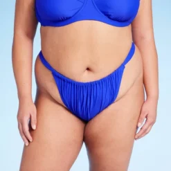 Women's Mid-Rise Cheeky High Leg Bikini Bottom - Wild Fable™ Blue 7 Women's Mid-Rise Cheeky High Leg Bikini Bottom - Wild Fable™ Blue -Wild Fable GUEST 9732027b 0efc 47c9 a00e 458bf5683679