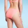 Women's Side Tab Cheeky Bikini Bottom - Wild Fable™ Pink -Wild Fable GUEST b22c4ca1 f18c 4db6 a3ec d69e04c315ab