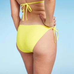 Women's Side-Tie Cheeky Bikini Bottom - Wild Fable™ Yellow -Wild Fable GUEST d60575f0 7377 464a 8b1f bea4ae4f1fb7