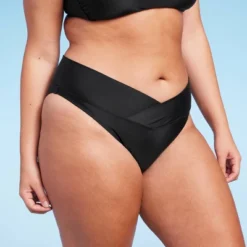 Women's Crossover High Leg Cheeky Mid-Rise Bikini Bottom - Wild Fable™ 28 Women's Crossover High Leg Cheeky Mid-Rise Bikini Bottom - Wild Fable™ -Wild Fable GUEST dda6cc56 70de 4699 9ae2 79727ec5a943