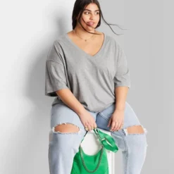 Women's Short Sleeve Relaxed Fit V-Neck T-Shirt - Wild Fable™ 11 Women's Short Sleeve Relaxed Fit V-Neck T-Shirt - Wild Fable™ -Wild Fable GUEST de2f8a46 b446 4432 bdf2 c15fe5d5e799