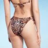 Women's Cut Out Strappy Side-Tie Extra High Leg Extra Cheeky Bikini Bottom - Wild Fable™ Multi Animal Print 2 Women's Cut Out Strappy Side-Tie Extra High Leg Extra Cheeky Bikini Bottom - Wild Fable™ Multi Animal Print -Wild Fable GUEST df7b90b2 b293 4ae6 bf7f 49eb22759dbe