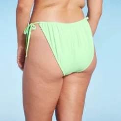 Women's Adjustable Coverage Side-Tie Bikini Bottom - Wild Fable™ Light Green 12 Women's Adjustable Coverage Side-Tie Bikini Bottom - Wild Fable™ Light Green -Wild Fable GUEST f478787b 27ad 4e92 ac3e 6e94f9bc12c8